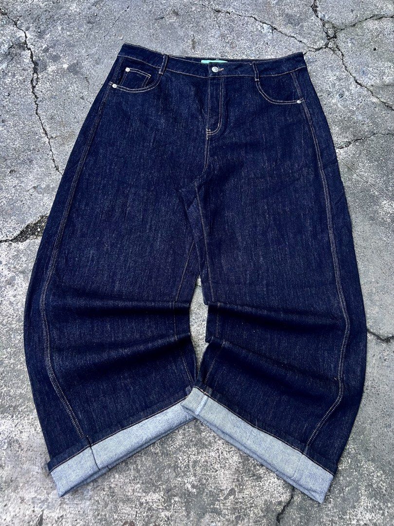 Dark RAW Wide Leg Denim Jeans (Category: Jeans) located in Manila. Submitted by fiercefox.4ae806 (Listing ID 1455854064, Image 1). Description: - Dark wash denim jeans - Wide leg cut with a relaxed fit - Cuffed hems - Classic five-pocket styling - Button and zip fly - Ideal for casual wear.