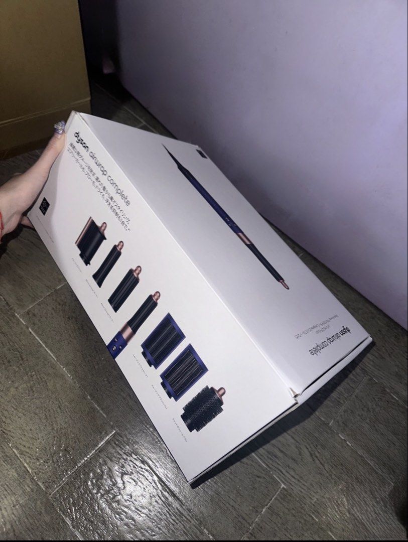 Dyson Airwrap | Blue Blush | Limited Edition (Category: Hair) located in Quezon City. Submitted by fiosells (Listing ID 1455821947, Image 3). Description: - Dyson Airwrap Complete Set with Full Box - Mint condition like new — only used less than 20 times - Comes with all attachments shown in the case - Versatile styling for curls, waves, smoothing, drying, straightening - Bought from Tokyo Japan - RSP: 35,900 MOP: PAYO MOD: SSS only - grab or lal