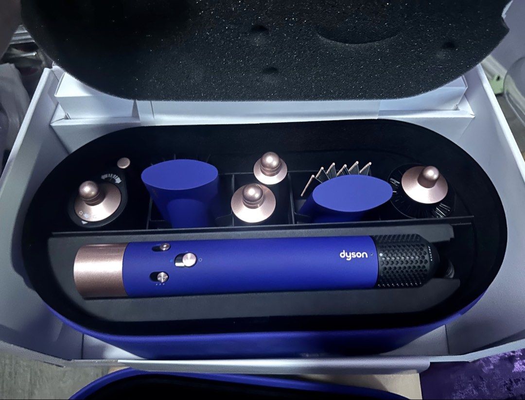 Dyson Airwrap | Blue Blush | Limited Edition (Category: Hair) located in Quezon City. Submitted by fiosells (Listing ID 1455821947, Image 1). Description: - Dyson Airwrap Complete Set with Full Box - Mint condition like new — only used less than 20 times - Comes with all attachments shown in the case - Versatile styling for curls, waves, smoothing, drying, straightening - Bought from Tokyo Japan - RSP: 35,900 MOP: PAYO MOD: SSS only - grab or lal