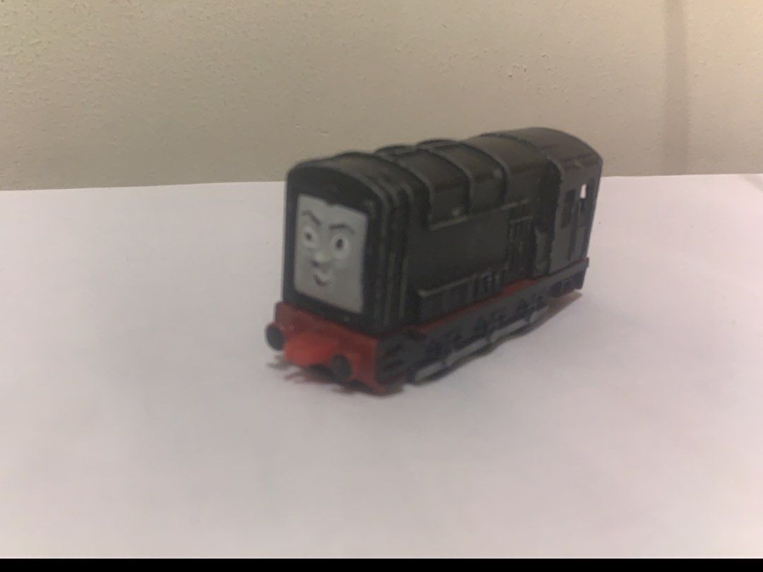 Ertl Diesel Thomas & Friends Train (VINTAGE) (Category: Vehicle & Diecast Models) located in Manila. Submitted by trueeagle-8c91 (Listing ID 1455804385, Image 1). Description: - Die-cast metal train engine - Character: Diesel from Thomas & Friends - Type: Ertl 1990 model - Brand: Ertl - Suitable for: Collectors and playtime - Condition: Shows some signs of wear from use Negotiable What you see is what you get Loc Dont Antonio QC.