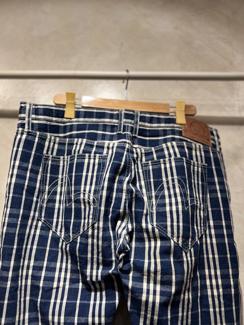 Evisu Seagull All-over indigo & white plaid check pattern (Category: Jeans) located in Manila. Submitted by -handpick- (Listing ID 1455765047, Image 3). Description: The selected region features a rare pair of vintage Evisu Lot 2009 denim jeans. Distinctive all-over indigo and white plaid/grid check pattern. Classic straight-leg silhouette with traditional five-pocket construction. Features the iconic tonal stitched “Seagull” logo on both back po