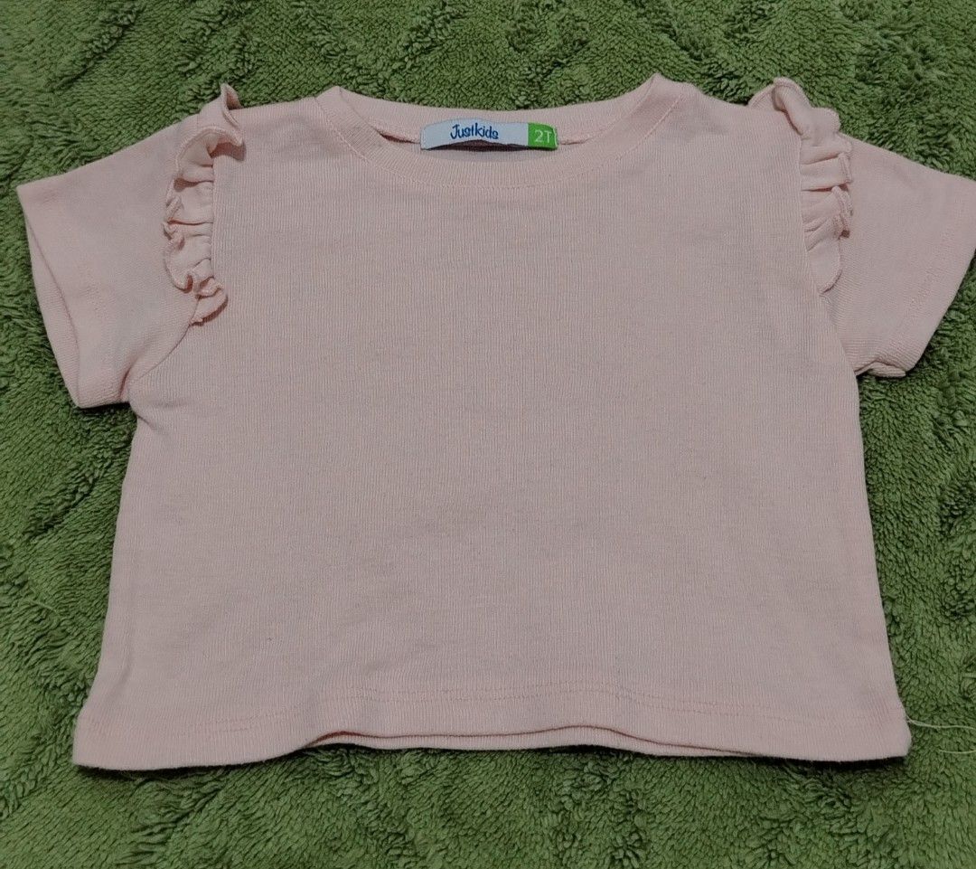 FREEBIE! ₱200+ PURCHASE (Category: Babies & Kids Fashion) located in Rizal. Submitted by zhellieme (Listing ID 1455826967, Image 1). Description: -Pink Ruffle Sleeve T-Shirt Size 2T - Adorable pink t-shirt from Justkids - Features cute ruffle details on the sleeves - Ideal for everyday wear - Easily pairs with shorts or skirts -Get this FREE clothing item with a minimum purchase of ₱200!.