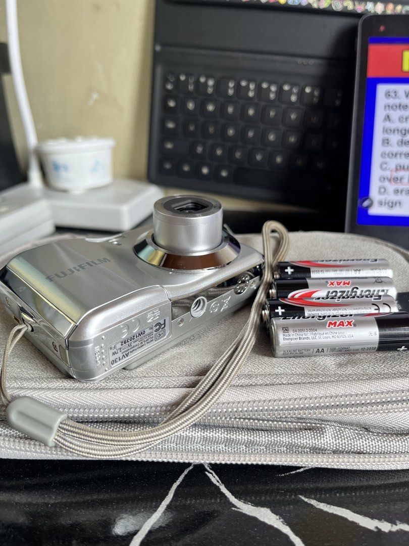 Fujifilm 12MP Digital Camera with Accessories (Category: Cameras) located in Mandaluyong City. Submitted by bonsaiesto (Listing ID 1455728532, Image 2). Description: - Fujifilm Digital Camera ( AV130) - 12 Megapixels - Fujinon Zoom Lens - Includes 4GB Toshiba SDHC Memory Card - Comes with Energizer AA Batteries - Ideal for casual photography and capturing memories Minimal scratch on screen .