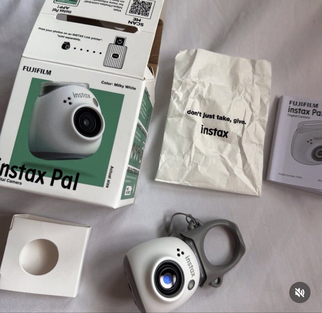 Fujifilm Instax Pal Digital Camera Milky White (Category: Cameras) located in Muntinlupa City. Submitted by ayebmedina (Listing ID 1455796632, Image 2). Description: - Fujifilm Instax Pal digital camera - Color: Milky White - Includes original box and packaging - Cute and compact design - Ideal for taking fun, memorable photos - Ready for its new owner! - RFS: need funds .