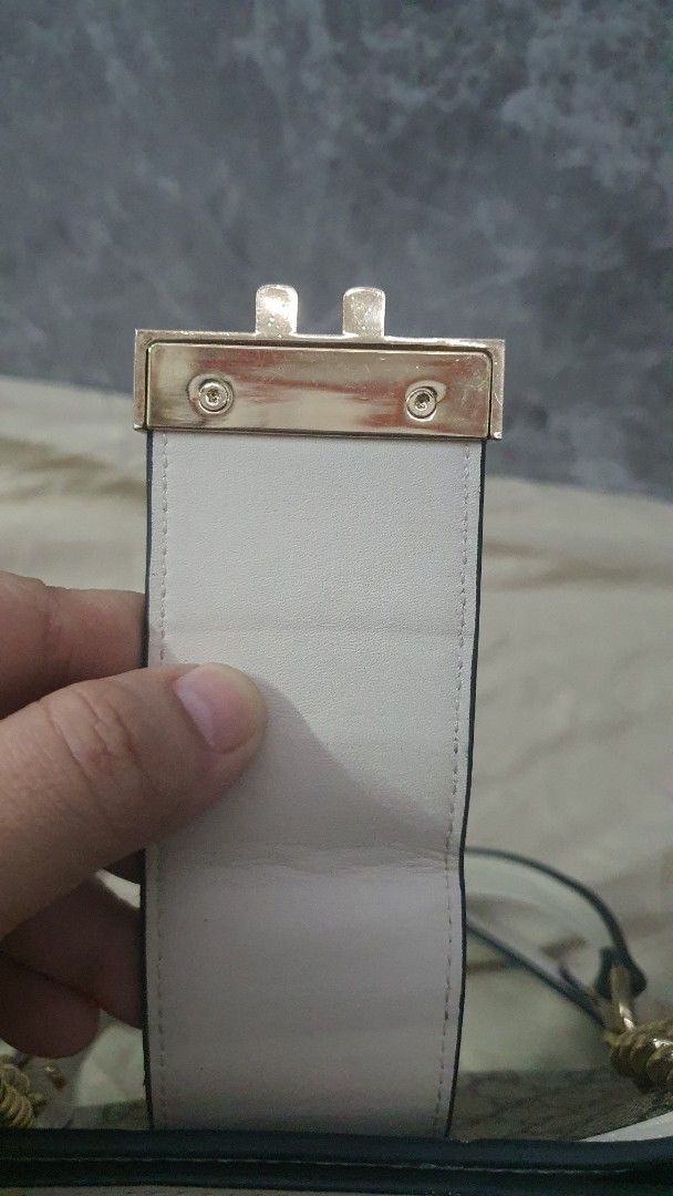 Gucci Padlock GG Supreme Canvas Shoulder Bag (Category: Luxury Bags & Wallets) located in Manila. Submitted by togodbethegloryteamjesus (Listing ID 1455682277, Image 3). Description: - Gucci shoulder bag - NGA please Self Authenticate - Classic GG Supreme canvas with white leather trim - Gold-tone hardware and chain strap - Interior with multiple compartments and coded - Secure lock closure on the front flap - Serial number visible inside for aut