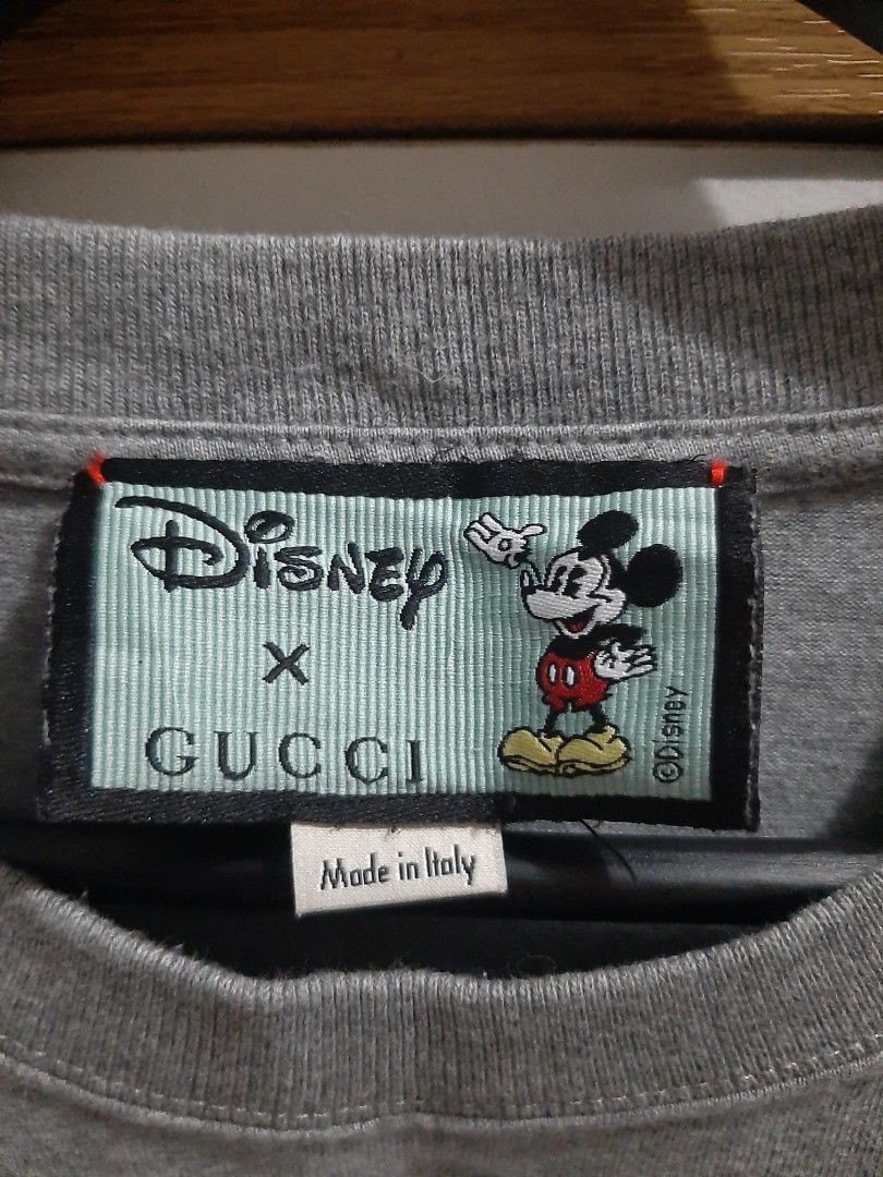 Gucci x Disney Mickey Mouse T-Shirt (Category: Luxury Apparel) located in Cavite. Submitted by dimesandthreadsph (Listing ID 1455677697, Image 3). Description: Take Note: Brand new condition. Hang tag na lang kulang. Oversized fitting. Gucci x Disney Mickey Mouse T-Shirt Price: 750ph Size: S Length: 26 Width: 22 Color Rate: 9/10 Excellent condition. No issue. No downpayment, no reservation. Color may vary due to lighting. Payment - PM for details