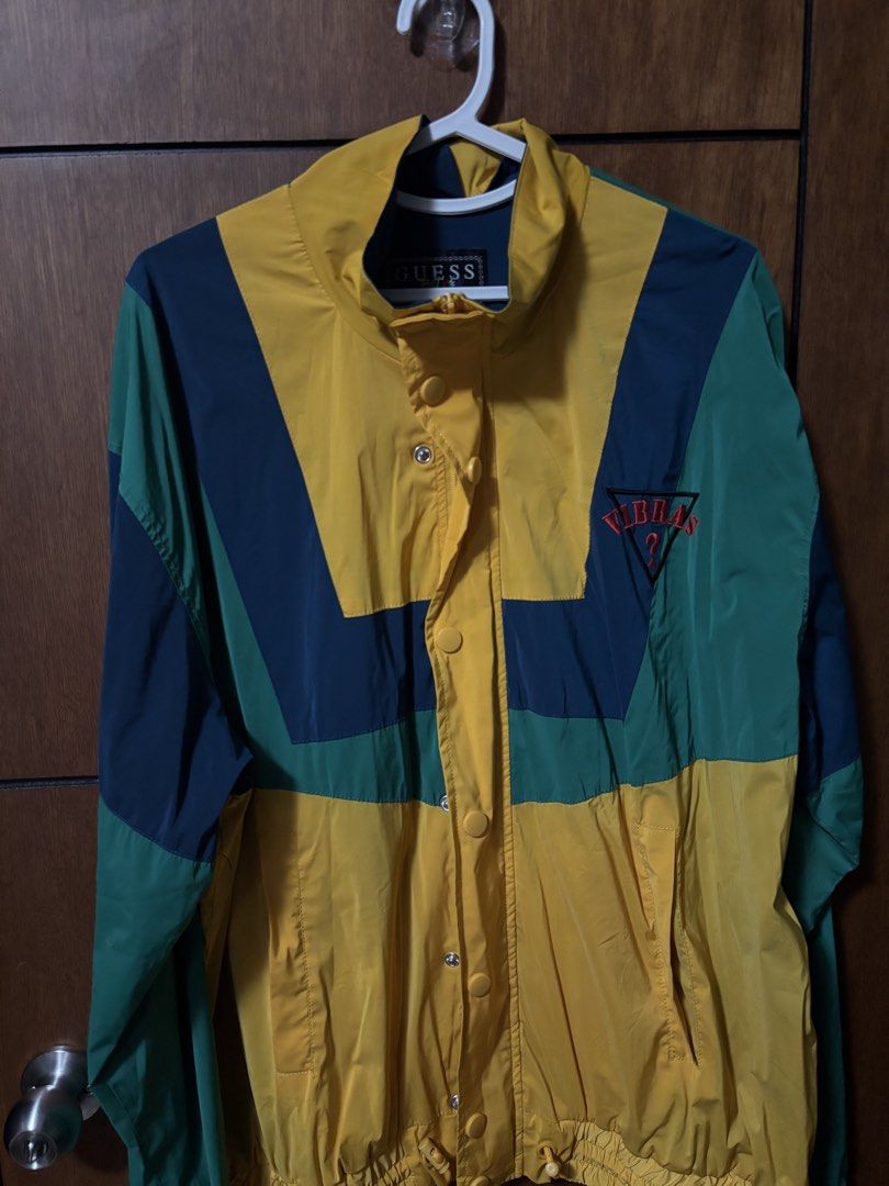 Guess x J. balvin Vibras Windbreaker Jacket (Category: Coats, Jackets and Outerwear) located in Muntinlupa City. Submitted by kdloading (Listing ID 1455733056, Image 1). Description: Guess x J.Balvin Vibras collaboration Rare jacket Oversize fit .
