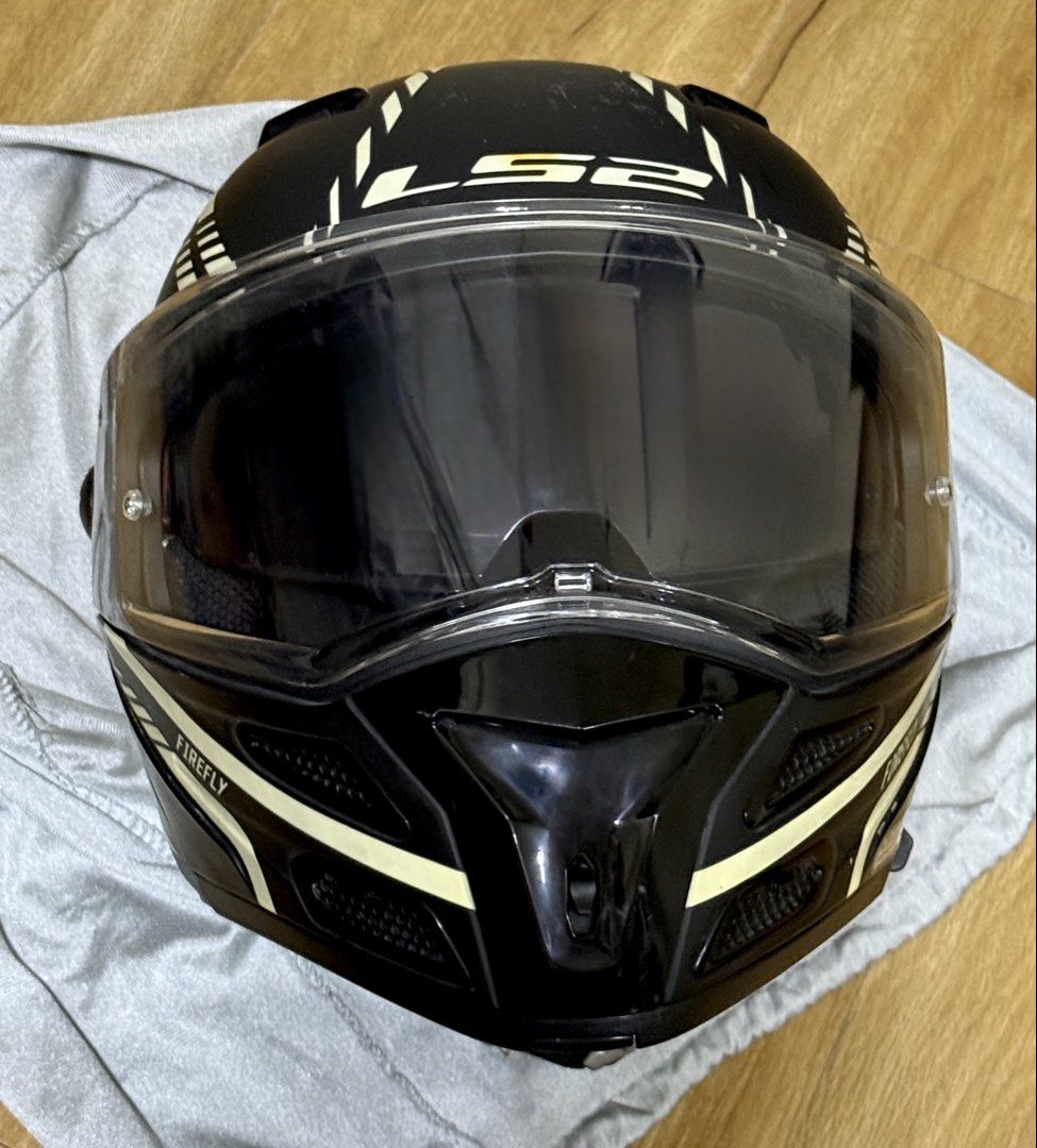 LS2 Helmet Motorcycle with Sun Visor (LS2 Metro Evo Firefly) (Category: Helmets and other Riding Gears) located in Taguig. Submitted by cathtorre21 (Listing ID 1455820147, Image 2). Description: - LS2 Metro Evo Flip-Up Helmet - Color: Black with Glow in the dark Accents - Unique 'Firefly' Shell Design - Convenient Flip-Up Chin Bar - Integrated Sun Visor - Excellent Ventilation - Includes Clear Outer Visor - Ready for your next adventure!.