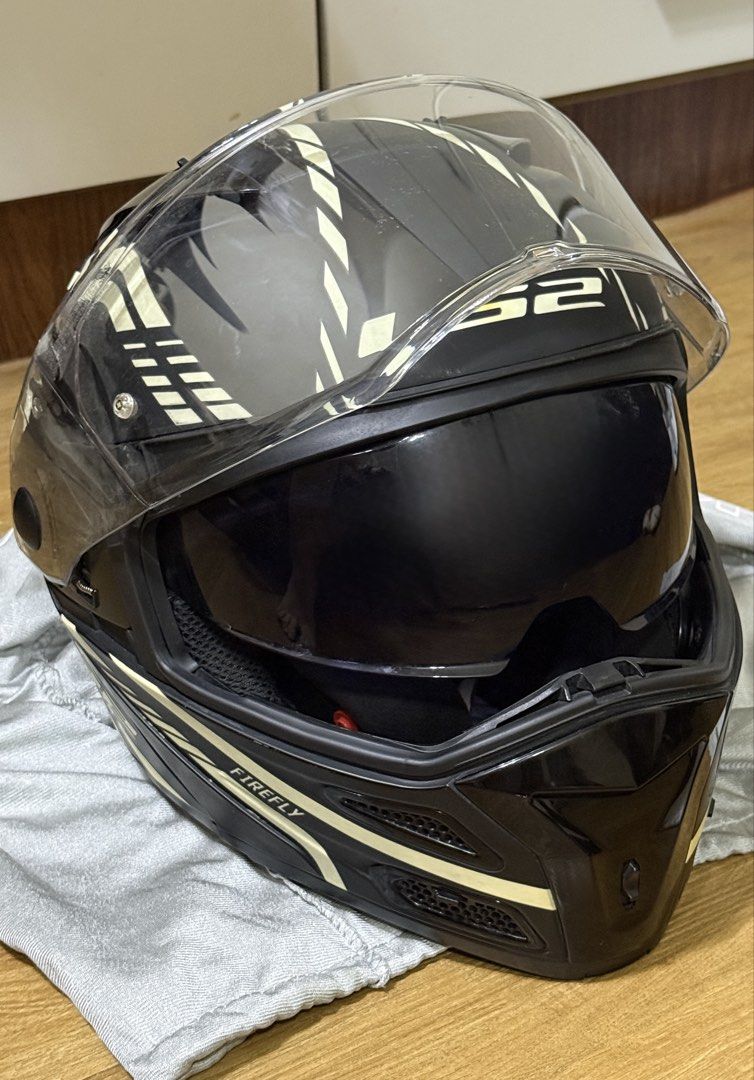 LS2 Helmet Motorcycle with Sun Visor (LS2 Metro Evo Firefly) (Category: Helmets and other Riding Gears) located in Taguig. Submitted by cathtorre21 (Listing ID 1455820147, Image 1). Description: - LS2 Metro Evo Flip-Up Helmet - Color: Black with Glow in the dark Accents - Unique 'Firefly' Shell Design - Convenient Flip-Up Chin Bar - Integrated Sun Visor - Excellent Ventilation - Includes Clear Outer Visor - Ready for your next adventure!.