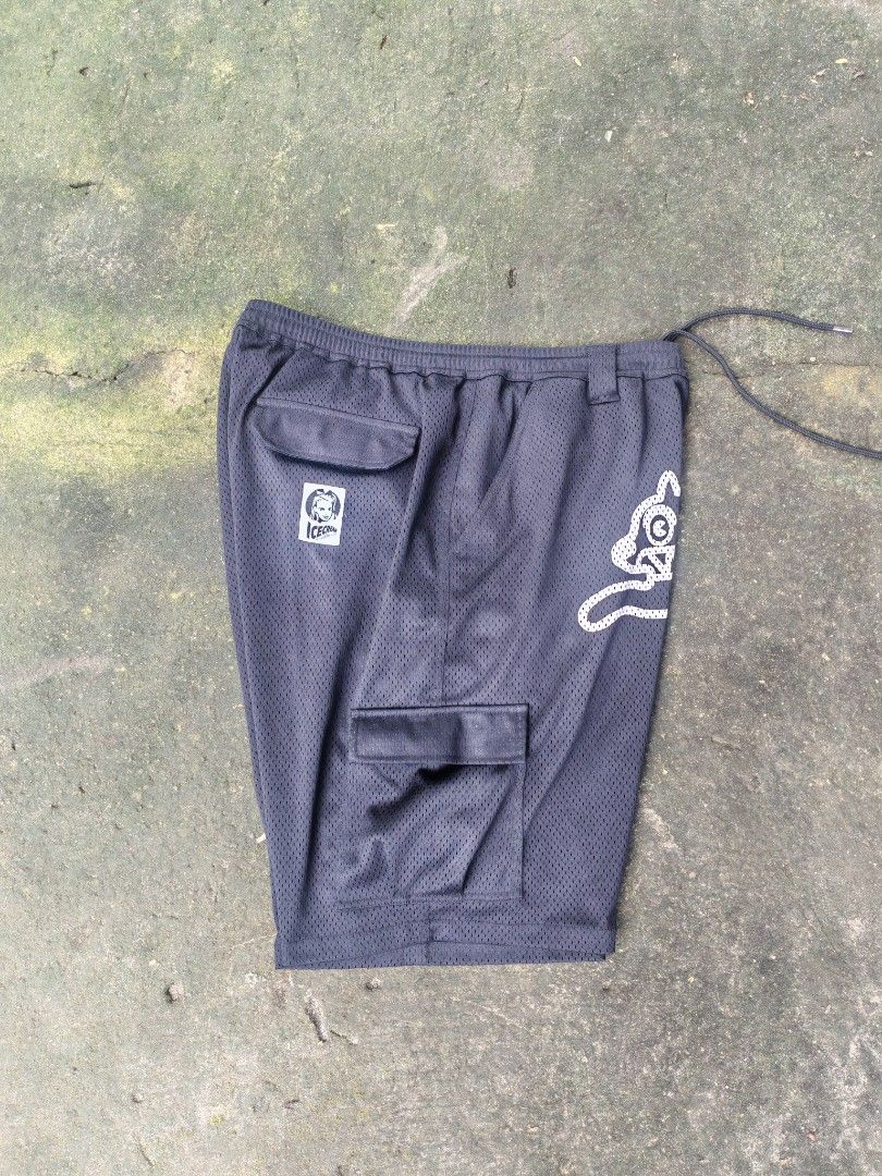 ICE CREAM "Running Dog" Mesh Cargo Shorts (Category: Shorts) located in Tarlac. Submitted by dhanmar.125 (Listing ID 1455701890, Image 2). Description: - Brand: ICE CREAM - Style: Black Mesh Cargo Shorts - Features: Iconic "Running Dog" graphic on front - Waist: Elastic waistband with drawstring - Pockets: Side cargo pockets - Origin: Made in China - Ideal for: Casual wear or sports.