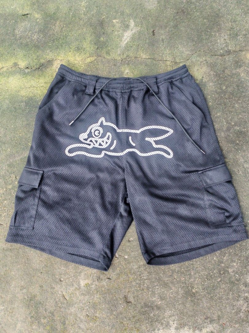 ICE CREAM "Running Dog" Mesh Cargo Shorts (Category: Shorts) located in Tarlac. Submitted by dhanmar.125 (Listing ID 1455701890, Image 1). Description: - Brand: ICE CREAM - Style: Black Mesh Cargo Shorts - Features: Iconic "Running Dog" graphic on front - Waist: Elastic waistband with drawstring - Pockets: Side cargo pockets - Origin: Made in China - Ideal for: Casual wear or sports.