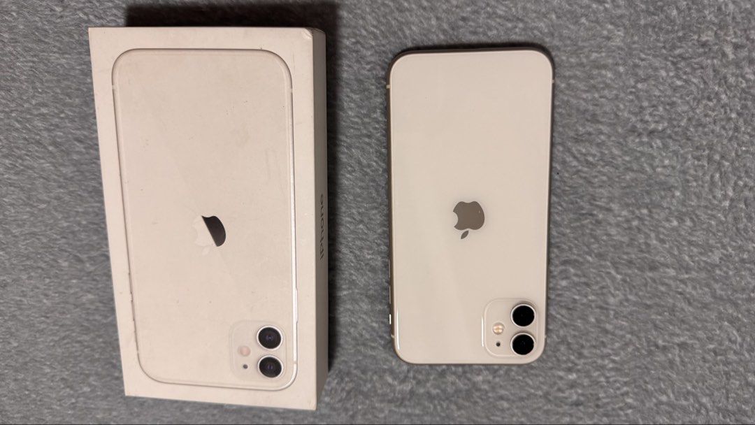 Iphone 11 white 64gb (Category: iPhone 11 Series) located in Pasig City. Submitted by ainee.and.emmett (Listing ID 1455815871, Image 2). Description: Iphone 11 64g white (first owner) Complete set with box / manual Sticker Original cord 84%BH No repair or replacement Original battery and lcd Unli check Strictly for meet up within pasig/ taguig location.