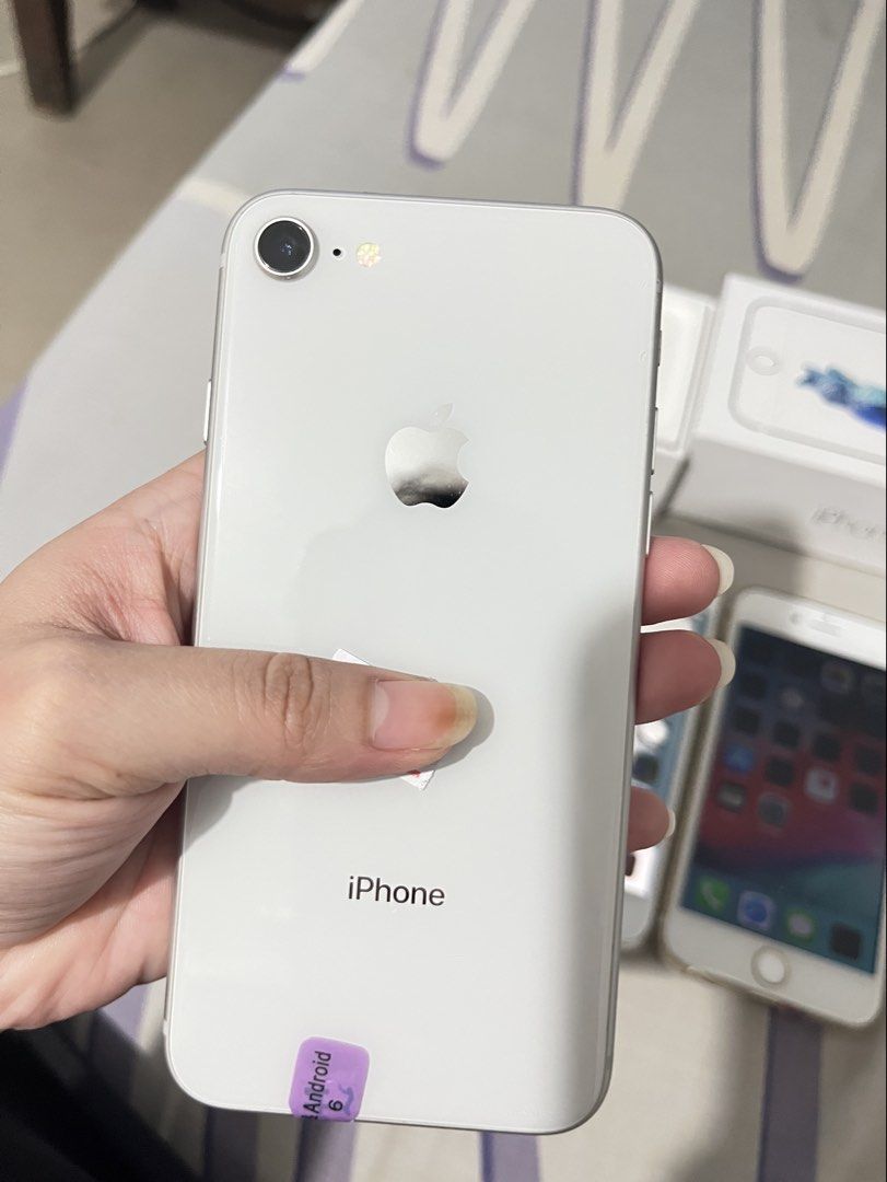 iPhone 8 - 64 GB (Category: iPhone 8 Series) located in Calamba. Submitted by declutsbysteff (Listing ID 1450558847, Image 1). Description: For Sale ✨ iPhone 8 - 64 GB - Silver (can choose color of your choice) - 100% battery health (replaced with original) - Inclusion comes with charger, earphones, and tempered glass. - Complete set with box. - Also comes with manual - Openline (no sim restrictions) - Preowned phone - Warranty applies (non-user’