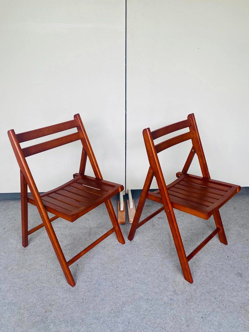 "JAPAN SURPLUS" 2PCS WOODEN FOLDING CHAIRS (Category: Chairs) located in Manila. Submitted by elliefurnies31 (Listing ID 1455839915, Image 3). Description: "JAPAN SURPLUS" 2PCS WOODEN FOLDING CHAIRS SIZE: 18L" x 17W" x 17Sh" x 31H" inches (AS-IS ITEM) IN GOOD CONDITION.