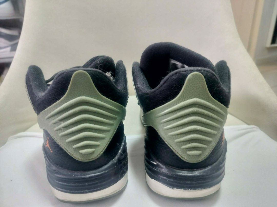 Jordan AuraMaxKids size 7Y (Category: Sneakers) located in Taguig. Submitted by ImpulzBuyer (Listing ID 1455692189, Image 2). Description: - Black Jordan sneakers with orange and green accents. - Lace-up closure for a secure fit. - Perforated toe box for breathability. - Visible Air cushioning in the sole for comfort. - Ideal for casual wear or light activities..