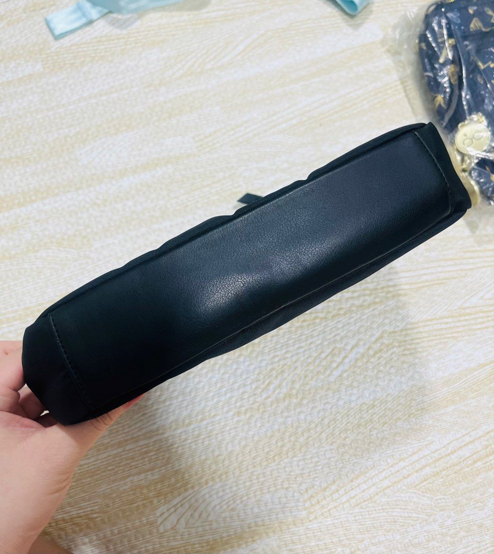 Jujube Eco Clutch Black Bag (Category: Cross-body Bags) located in Mandaluyong City. Submitted by clairie03 (Listing ID 1455696467, Image 2). Description: Signs of usage on D ring With detachable adjustable long strap Used as clutch or crossbody.