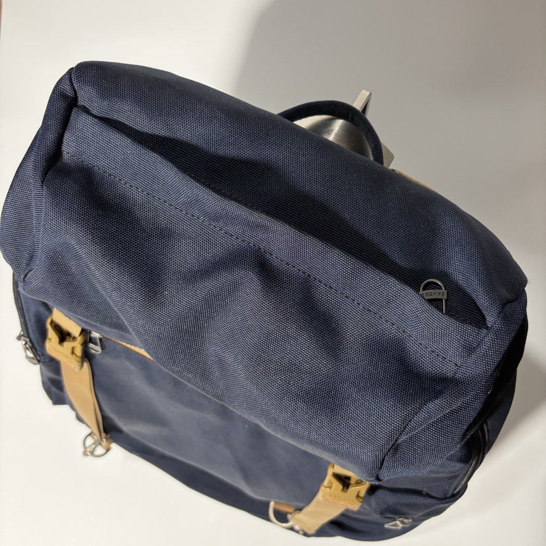 Kangol Glamping Mount backpack cordura fabric (Category: Hiking & Camping) located in Magalang. Submitted by luxgood18 (Listing ID 1455796286, Image 2). Description: Product Name: Glamping Mount Backpack 1083 NAVYSize: Width 30cm x Height 50cm, Depth: 14.5cmLaptop Compartment: Width 29cm x Height 40cmMaterial: POLY + CODURA (Cordura) Large-capacity outdoor-style backpack inspired by camping themes for the F/W season, perfect for daily use or trav
