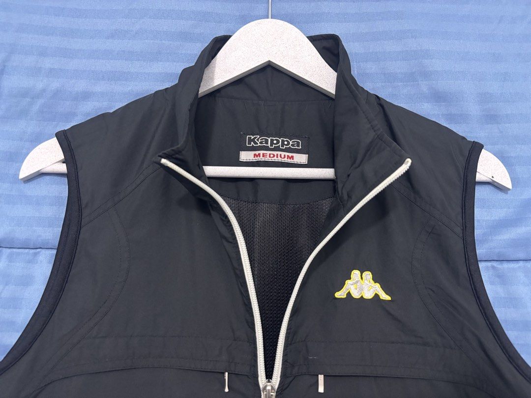 Kappa Black Sleeveless Vest Jacket Medium (Category: Vests) located in Manila. Submitted by reymartreg23298 (Listing ID 1455827410, Image 2). Description: Kappa Vest Width 21 Length 25.5 Medium fitting As New condition Location. Pasay City Metro Manila Courier. J&T FB : Reymart Regis.
