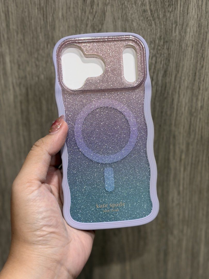 Kate Spade iPhone 17 Pro Max Magsafe Purple Glitter Case (Category: Cases & Sleeves) located in Caloocan City. Submitted by irisescalada (Listing ID 1455783911, Image 2). Description: Hi! Selling my Kate Spade magsafe case for iPhone 17 Pro Max. Originally bought at around 2.7k last year, used for around 2 months only and stored properly in its box. Slight dirt due to usage but not that noticeable. .