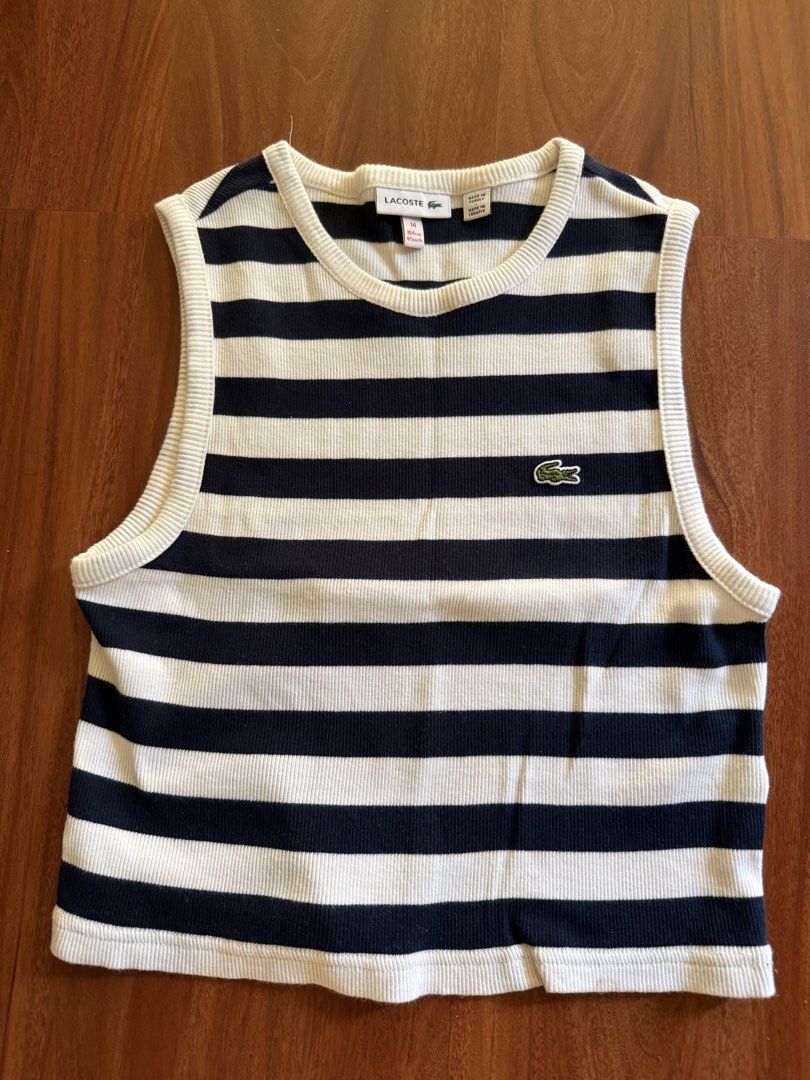 Lacoste Striped Ribbed Tank Top Size 14 (Category: Sleeveless) located in Makati City. Submitted by larcie (Listing ID 1455695299, Image 1). Description: - Navy and white striped ribbed tank top by Lacoste - Sleeveless with crew neck - Iconic Lacoste crocodile logo on the front - Made in Turkey - Size 14 (fits 164cm/65inch) - Ideal for casual outfits -used only twice.