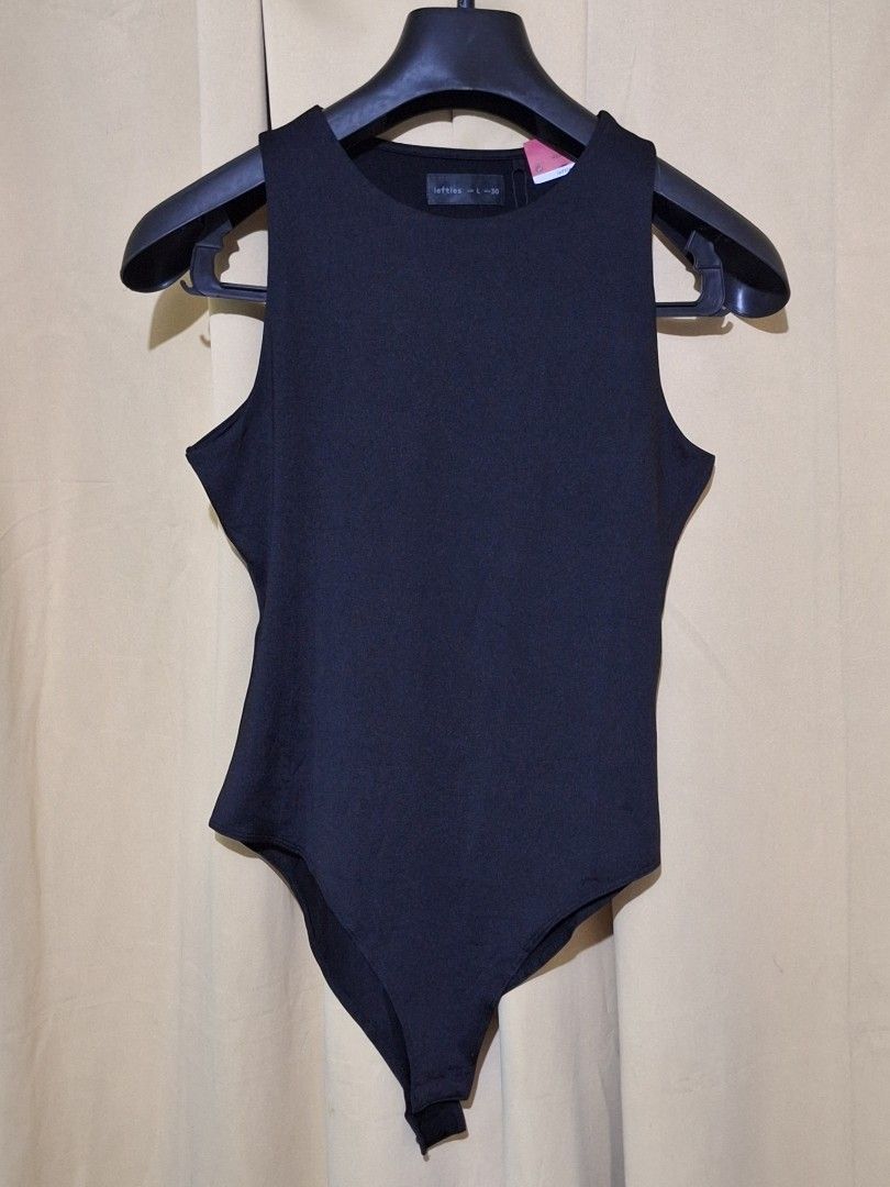 Lefties Black Sleeveless Bodysuit Size L (Category: Sleeveless) located in Manila. Submitted by viiiieve (Listing ID 1455838676, Image 1). Description: - Black sleeveless bodysuit from Lefties - Size L (MEX 30) - Simple and versatile design - Perfect for layering or wearing on its own - Comfortable fabric - Wardrobe essential.
