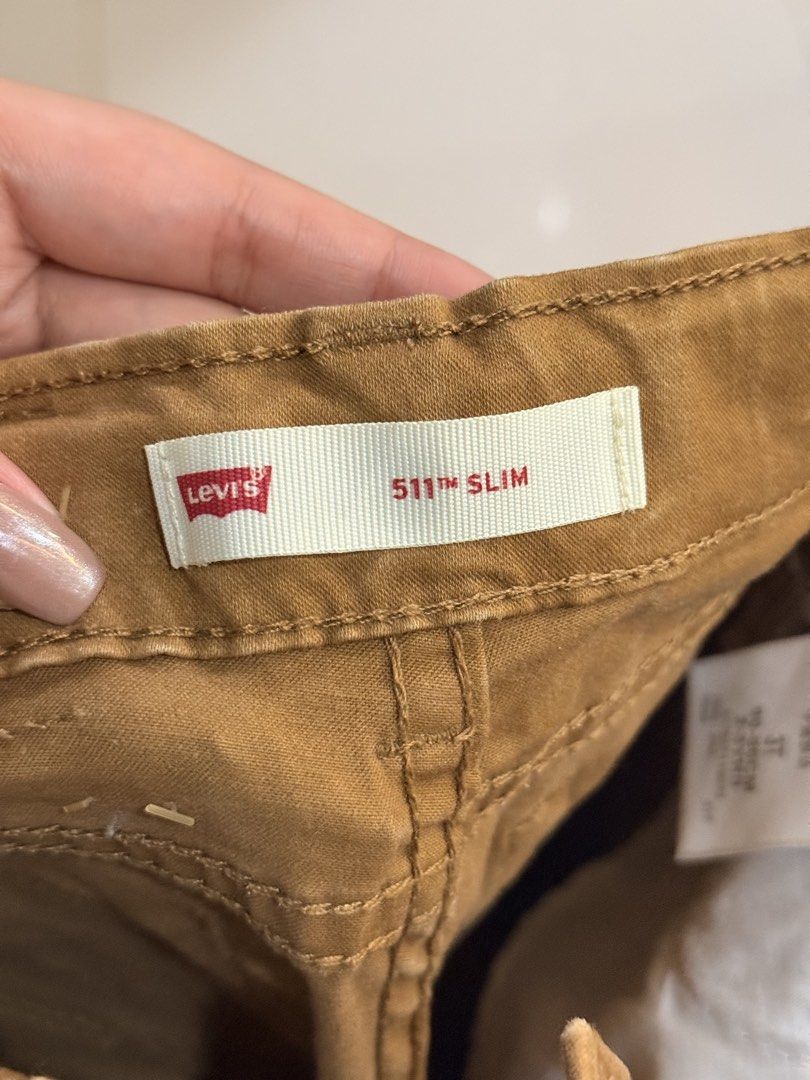Levi's 511 Slim Brown Pants Toddler Size 3T (Category: Babies & Kids Fashion) located in Urdaneta. Submitted by glamduck (Listing ID 1455844983, Image 3). Description: - Brand: Levi's - Style: 511 Slim Fit - Color: Brown - Size: 3T (fits 90-96cm or 2-3 years) - Material: 97% Cotton, 3% Elastane - Features: Comfortable for everyday wear, durable - Perfect for: Adding a stylish and practical piece to your toddler's wardrobe.