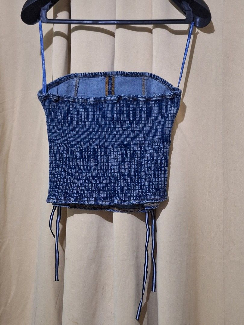 Lone Star Denim Corset Top Size M (Category: Others Tops) located in Manila. Submitted by viiiieve (Listing ID 1455837793, Image 2). Description: - Denim corset top from Lone Star - Features smocked back - Lace-up details on front and sides - Size: Medium (M) - Versatile: Great for layering or wearing on its own -remkvabke ties on the side.
