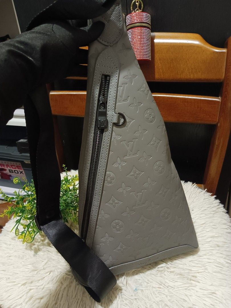 Louis Vuitton Monogram Embossed Sling Bag Grey (Category: Luxury Bags & Wallets) located in Digos. Submitted by chihanu (Listing ID 1455829263, Image 1). Description: - Louis Vuitton sling bag - Classic monogram pattern - Zip closure - Adjustable strap - Ideal for everyday use - Made in France.