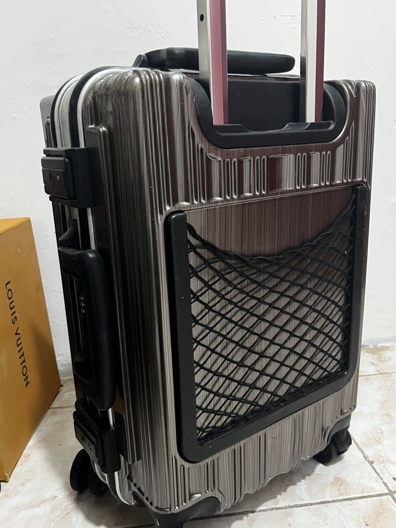 LUGGAGE (Category: Luggage) located in Manila. Submitted by zhy2604 (Listing ID 1455725525, Image 3). Description: - Stylish metallic hard case luggage - Durable ribbed exterior design - Built-in TSA lock for security - Smooth-rolling wheels for easy maneuverability - Spacious interior with securing straps - Premium look and feel.