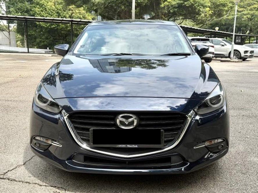 Mazda 3 Hatchback 1.5 Deluxe (A) (Category: Used Cars) located in Singapore. Submitted by m_macztech (Listing ID 1455687845, Image 2). Description: ➡️ Features Responsive and efficient 1.5l 4-cylinder in-line 16-valve DOHC SkyActiv-G. 6 speed automatic transmission with 118 Bhp. ℹ️ Accessories Multi-function Steering Wheel, Folding Side Mirrors, Multi-function Steering Wheel, Keyless Entry, Sunroof. ✅ One Owner Unit with Lowest mileage in the mar