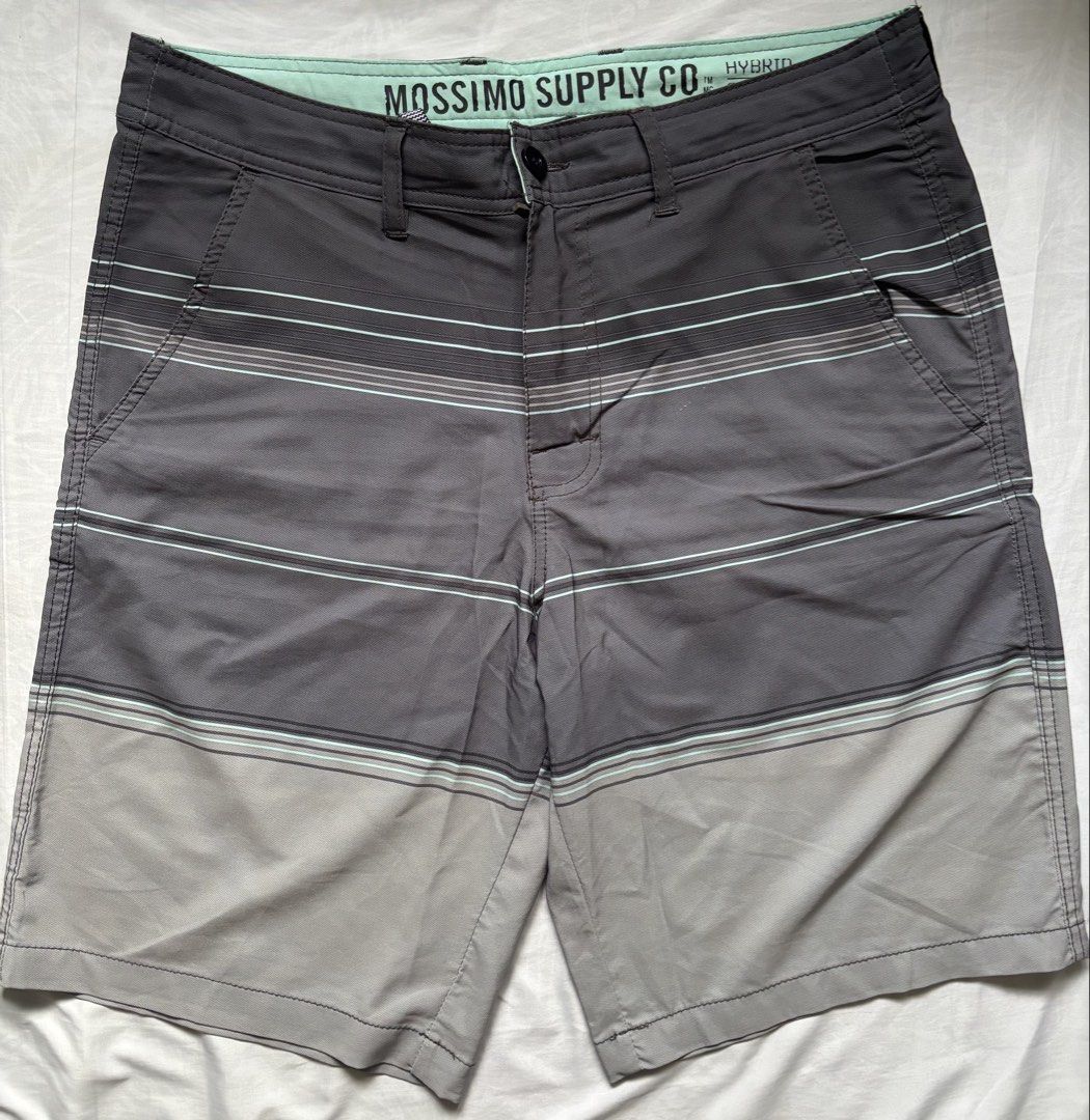 Mossimo Board Shorts (Category: Shorts) located in Nabua. Submitted by prlvdthgss (Listing ID 1455722172, Image 1). Description: 📌 Size: 34 📌 Color: Gray/Charcoal with mint & white stripes 📌 Hybrid shorts — perfect for casual wear, beach days, or everyday use 📌 Functional front & back pockets 📌 Comfortable and lightweight material 📌 Preloved — good overall condition Price+SF Gcash/Maribank 📍camsur, bicol.