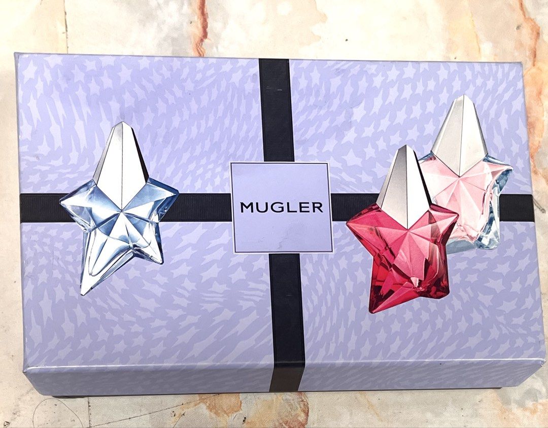Mugler Angel Mini Perfume Gift Ser (Category: Fragrance & Deodorants) located in Quezon City. Submitted by babybutton2018 (Listing ID 1455709488, Image 1). Description: Mugler Angel Perfume Gift Set Size: 5 ml each Two bottles left, gave away the third bottle Bought at Macy’s New York.