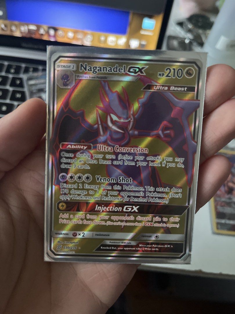 Naganadel GX Full Art 230/236 (Category: Raw Singles) located in Manila. Submitted by ignasho (Listing ID 1455697757, Image 1). Description: - Naganadel GX Full Art Pokemon Card - Card is protected in a sleeve, binder condition - Torkoal 230/236.