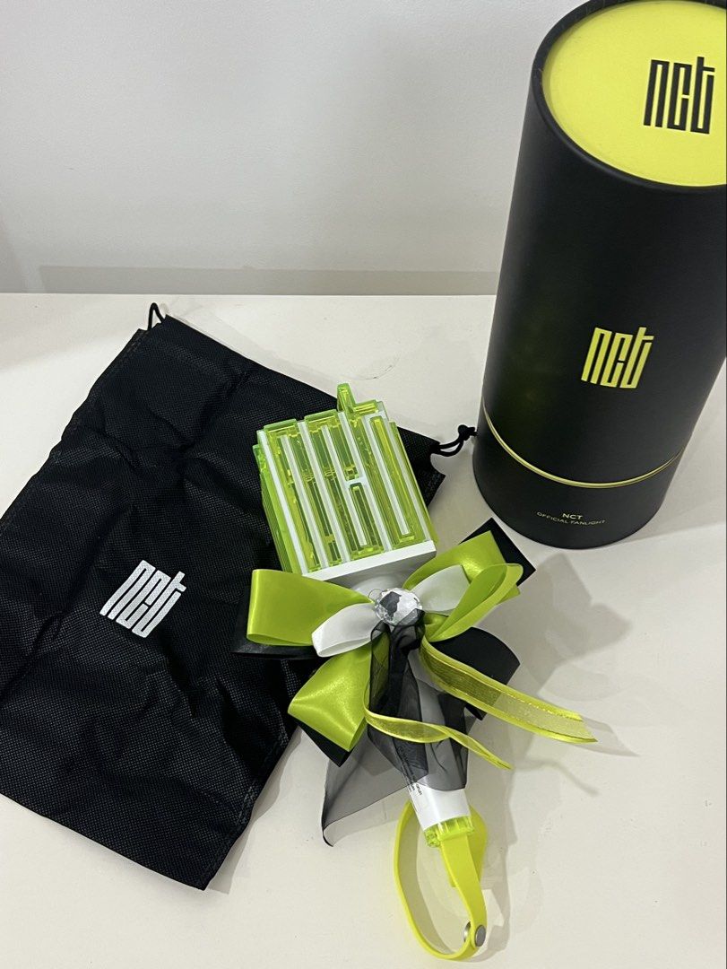 NCT Official Fanlight / Neobong V1 Customized Set (Category: K-Wave Merchandise) located in Manila. Submitted by chesbedumb (Listing ID 1455796645, Image 2). Description: official NCT lightstick! - only used once - fully functional - good condition / well-kept - no major damages - price is negotiable! inclusions: - original case - original dust bag - original strap - custom bow/ribbon decoration can provide video proof of functionality available 