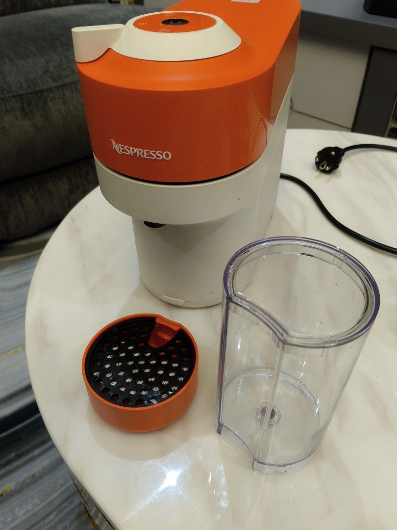 Nespresso Coffee Machine - Limited Edition Pantone Orange (Category: Coffee Machines & Makers) located in San Juan City. Submitted by miles567 (Listing ID 1455776973, Image 2). Description: Limited Edition Pantone Orange Vertuo Pop Nespresso Machine Rfs: decluttering. rarely used. upgraded to La Marzocco - Nespresso coffee machine in eye-catching Pantone Mountain Orange - Compact design, ideal for small kitchens - Comes with used capsule containe