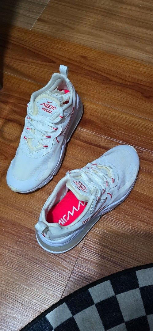 Nike Air Max 270 React White Red US 7 (Category: Sneakers) located in Marikina City. Submitted by jona.jah (Listing ID 1455764285, Image 1). Description: - White Nike Air Max 270 React sneakers - Red accents on laces and inner lining - Size: US 7 (UK 4.5, EUR 38) - Perfect for running or casual wear - Soles show minor dirt from normal use.