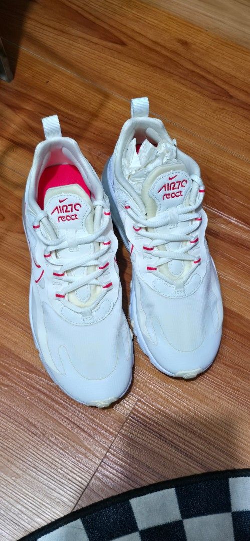 Nike Air Max 270 React White Red US 7 (Category: Sneakers) located in Marikina City. Submitted by jona.jah (Listing ID 1455764285, Image 2). Description: - White Nike Air Max 270 React sneakers - Red accents on laces and inner lining - Size: US 7 (UK 4.5, EUR 38) - Perfect for running or casual wear - Soles show minor dirt from normal use.