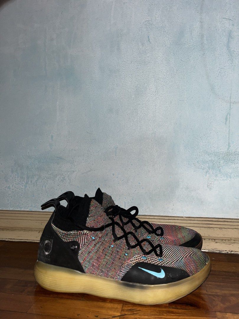 Nike KD 11 Multicolor (Category: Sneakers) located in Manila. Submitted by caponponluis (Listing ID 1455709732, Image 1). Description: nike kd 11 multicolor size 11 still good to use issues: (see pics for details) - yellowish sole - sole rep at front only - no box, pair only ₱1,300 nego.
