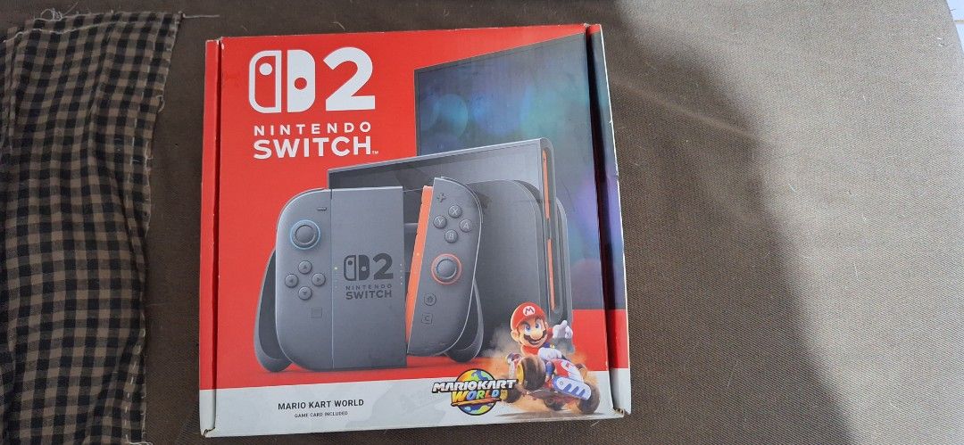 Nintendo Switch2 (Category: Nintendo) located in Manila. Submitted by jheveng (Listing ID 1455771655, Image 2). Description: - Nintendo Switch2 Console with Joy-Cons - Includes Dock, AC Adapter, and HDMI Cable - All items in original packaging - Ready for immediate gaming fun! - All items in the box included.