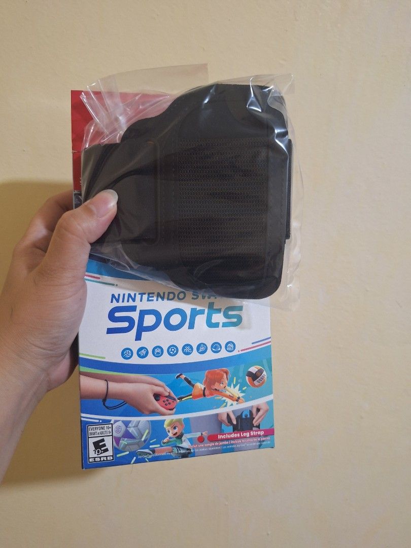Nintendo Switch Sports Game with Leg Strap (Category: Nintendo) located in Manila. Submitted by jheveng (Listing ID 1455740155, Image 2). Description: - Nintendo Switch Sports game cartridge included - Leg strap accessory included - All items in original case - Great for active gaming - Fun for the whole family.