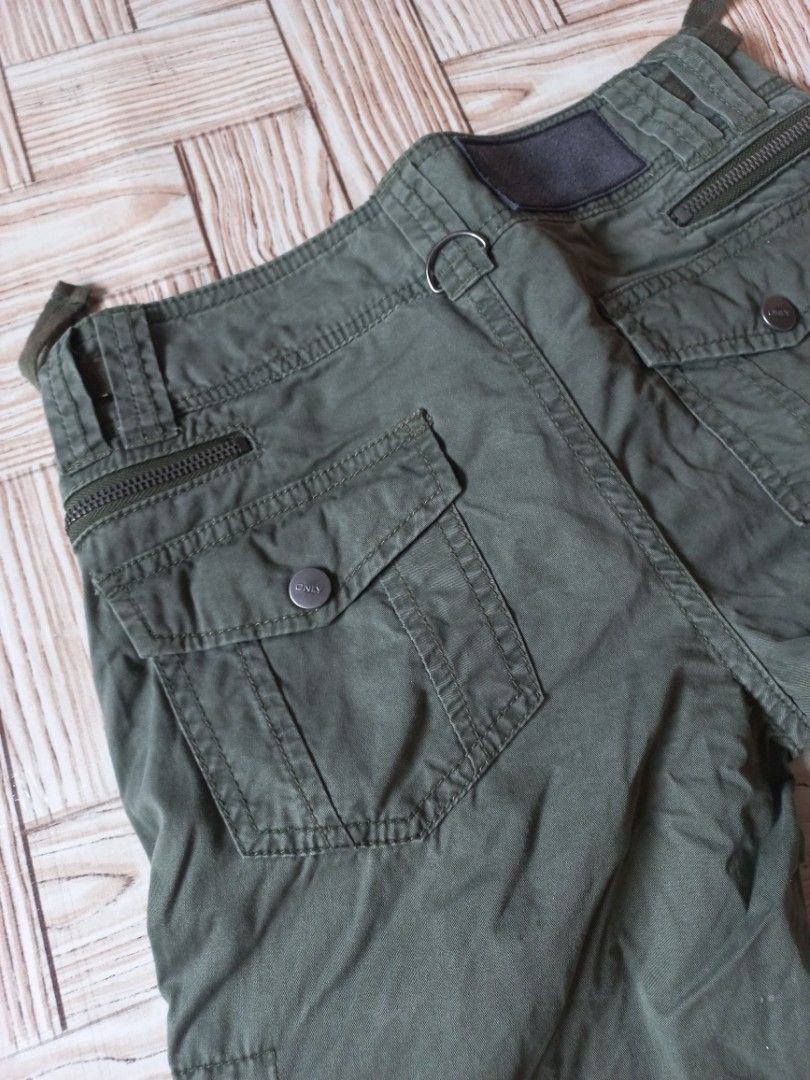 Olive Green Cargo Pants Size S | Y2k , Acubi (Category: Other Bottoms) located in Rizal. Submitted by magi_declutters (Listing ID 1455724216, Image 3). Description: - Olive green cargo pants - Multiple pockets with zippers and buttons - Adjustable straps at the waist - Leg opening: 24 cm - Length: 95 cm - Waist: 66 cm - Width: 40 cm.