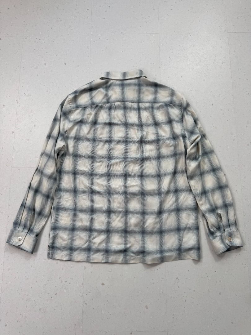 Our Legacy Forever Plaid Viscose Shirt (Category: Luxury Apparel) located in Makati City. Submitted by donda.archives (Listing ID 1455693576, Image 2). Description: -100% viscose. -Natural shell buttons. -Strictly symmetrical plaid. -Very soft, breathable, and silky. Very soft, relatively thin. 100% viscose feels very comfortable, but it has a downside—it wrinkles easily, which is a characteristic of Tencel fabric. A vertical black line in the ce