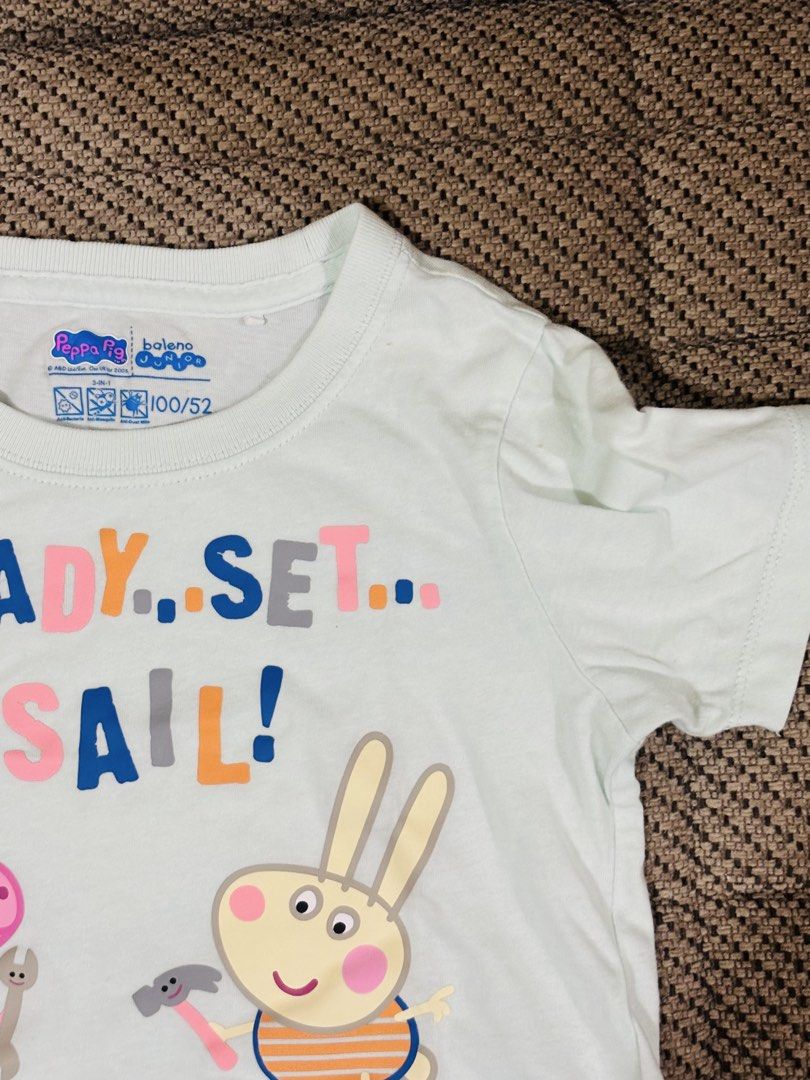 Peppa Pig Baleno Kids (Category: Babies & Kids Fashion) located in La Trinidad. Submitted by secondsmatter (Listing ID 1455791251, Image 2). Description: - Cute light blue Peppa Pig t-shirt - Features Peppa and Suzy Sheep - Text: 'READY.. SET.. SAIL!' - Ideal for Peppa Pig fans - Brand: Baleno Children - Size: 100/52.