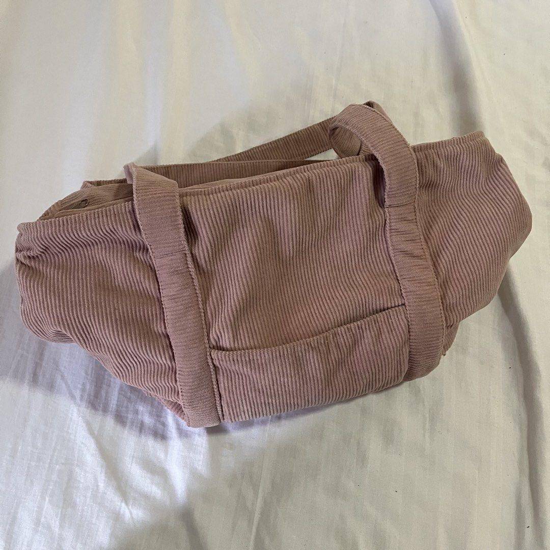 Pink Corduroy Tote Bag (Category: Tote Bags) located in Bacolor. Submitted by declutteryin (Listing ID 1455753024, Image 2). Description: Cute pink corduroy tote bag from CEDO (ig) Front pocket for easy access Pink color is more muted in person Very spacious With fabric lining inside With signs of use .