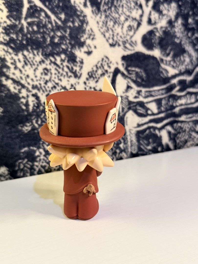 POP MART Zsiga Borderline Drifter Series (Category: Designer & Blind Box Toys) located in Quezon City. Submitted by lunalivie (Listing ID 1455767460, Image 2). Description: - Adorable collectible figure - Unique hat decorated with houses - Holding a green ball and a purple object - Features a small bear detail on the back of the outfit - Ideal for display or as a gift for collectors - Stands out on any shelf Displayed only.