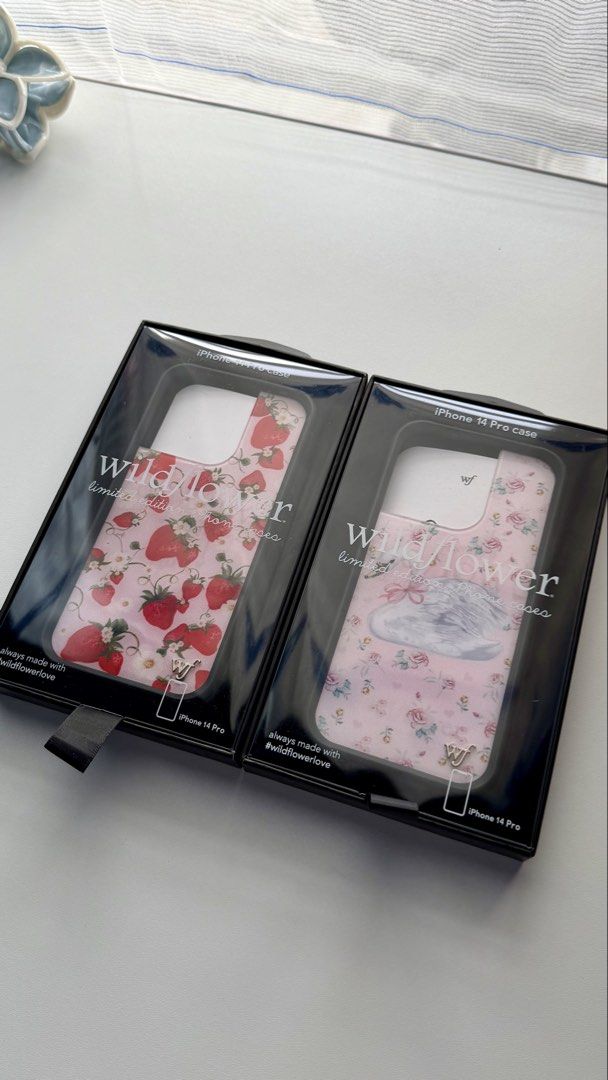 PRE-LOVED Wildflower Case for iPhone 14 Pro (Category: Cases & Sleeves) located in Dasmarinas. Submitted by cheesycakee (Listing ID 1455734127, Image 2). Description: I'm selling my personal pre-loved Wildflower cases for iPhone 14 Pro. Used, but still in pristine condition. RFS: Upgraded to a new phone. Location: Dasmariñas City, Cavite.