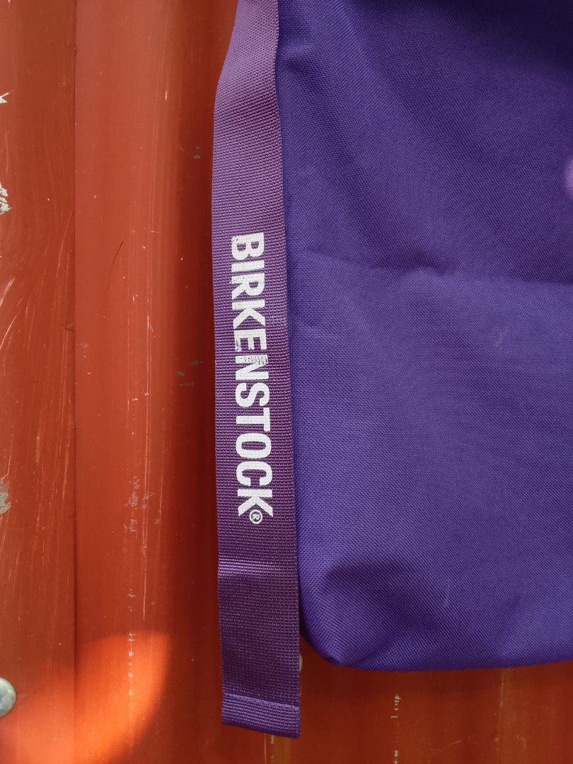 Purple Birkenstock Tote Bag (Category: Tote Bags) located in Manila. Submitted by booool_034 (Listing ID 1455756936, Image 2). Description: - Authentic Purple Birkenstock tote bag - Features the iconic Birkenstock logo on the strap - Simple and functional design - Secure snap button closure - Minor ink marks on fabric, clearly shown in photos other is sun reflection only - Perfect for everyday use .