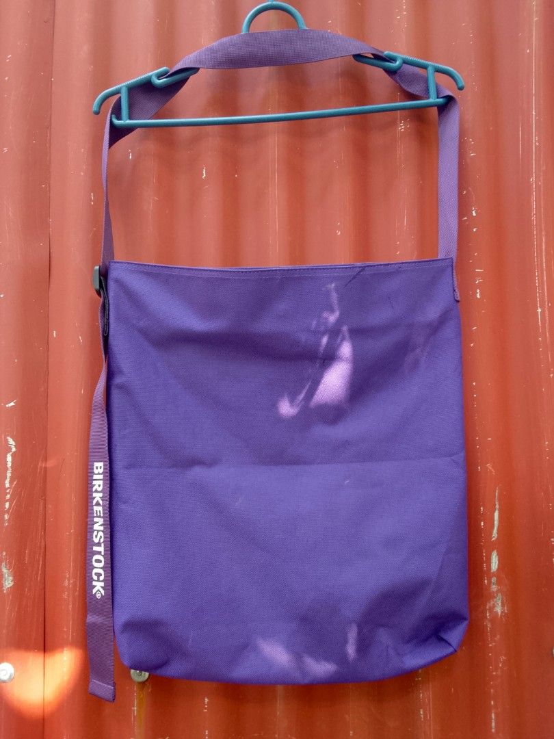 Purple Birkenstock Tote Bag (Category: Tote Bags) located in Manila. Submitted by booool_034 (Listing ID 1455756936, Image 1). Description: - Authentic Purple Birkenstock tote bag - Features the iconic Birkenstock logo on the strap - Simple and functional design - Secure snap button closure - Minor ink marks on fabric, clearly shown in photos other is sun reflection only - Perfect for everyday use .