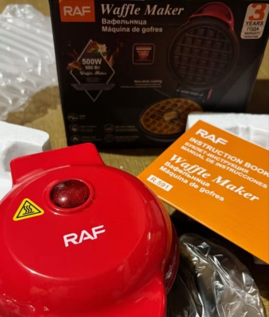 RAF Waffle Maker 500W Non-stick Coating (Category: Cookware & Accessories) located in Manila. Submitted by ljaneee (Listing ID 1455798775, Image 2). Description: - RAF Waffle Maker - 500W Power - Non-stick coating for easy cleaning - Double-sided heating for even cooking - Includes instruction manual - Perfect for breakfast and snacks.