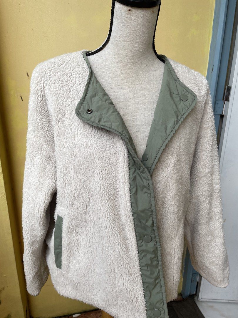 Reversible Quilted Fleece Jacket - Sage Green (Category: Coats, Jackets and Outerwear) located in Pasig City. Submitted by khaleisi (Listing ID 1455676386, Image 3). Description: - Super cozy reversible jacket - One side: Quilted sage green - Other side: Fluffy cream fleece - Snap button closure - Pockets on both sides - Ideal for layering and cooler weather - Bust 40-46” length 23”.